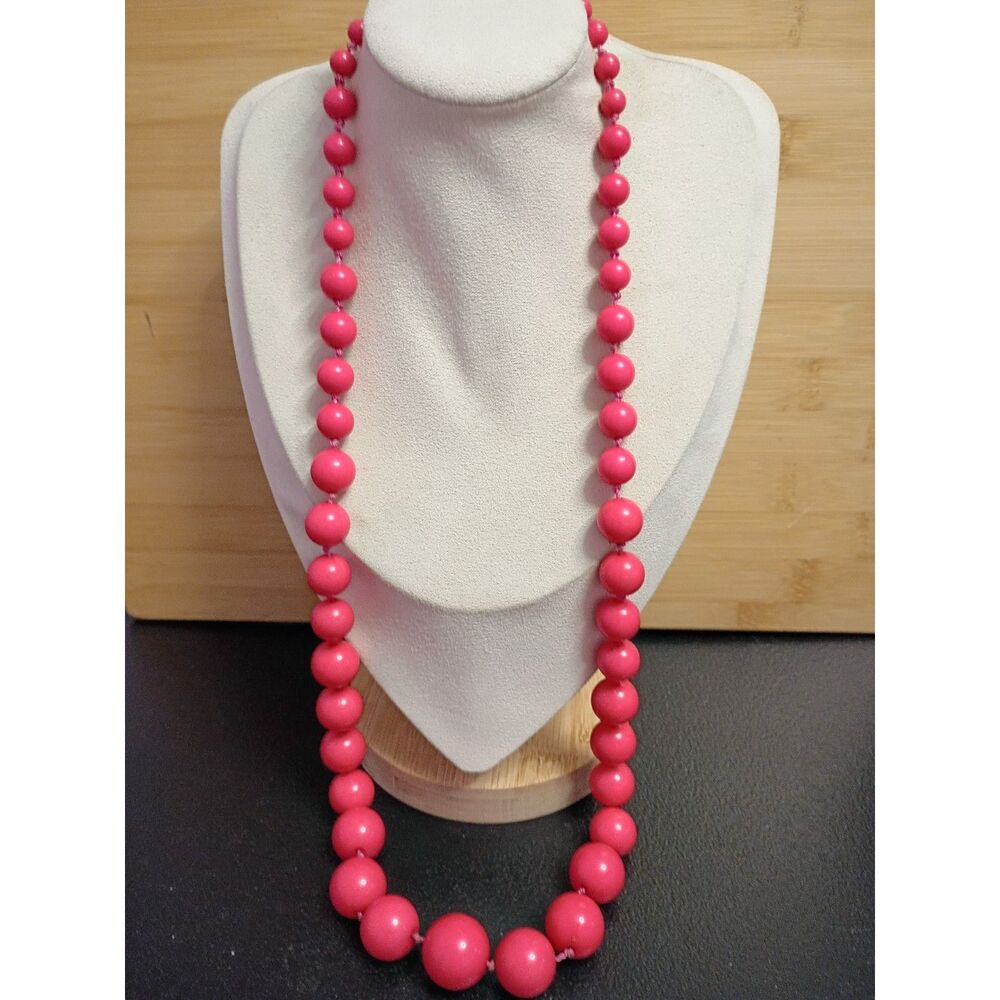 Vintage Beautiful Opera Length Necklace has Graduated Pink Lucite Knotted beads
